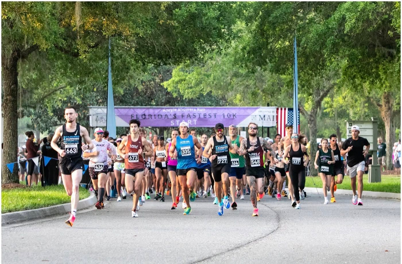 Runners taking off at the start of a 10K road race